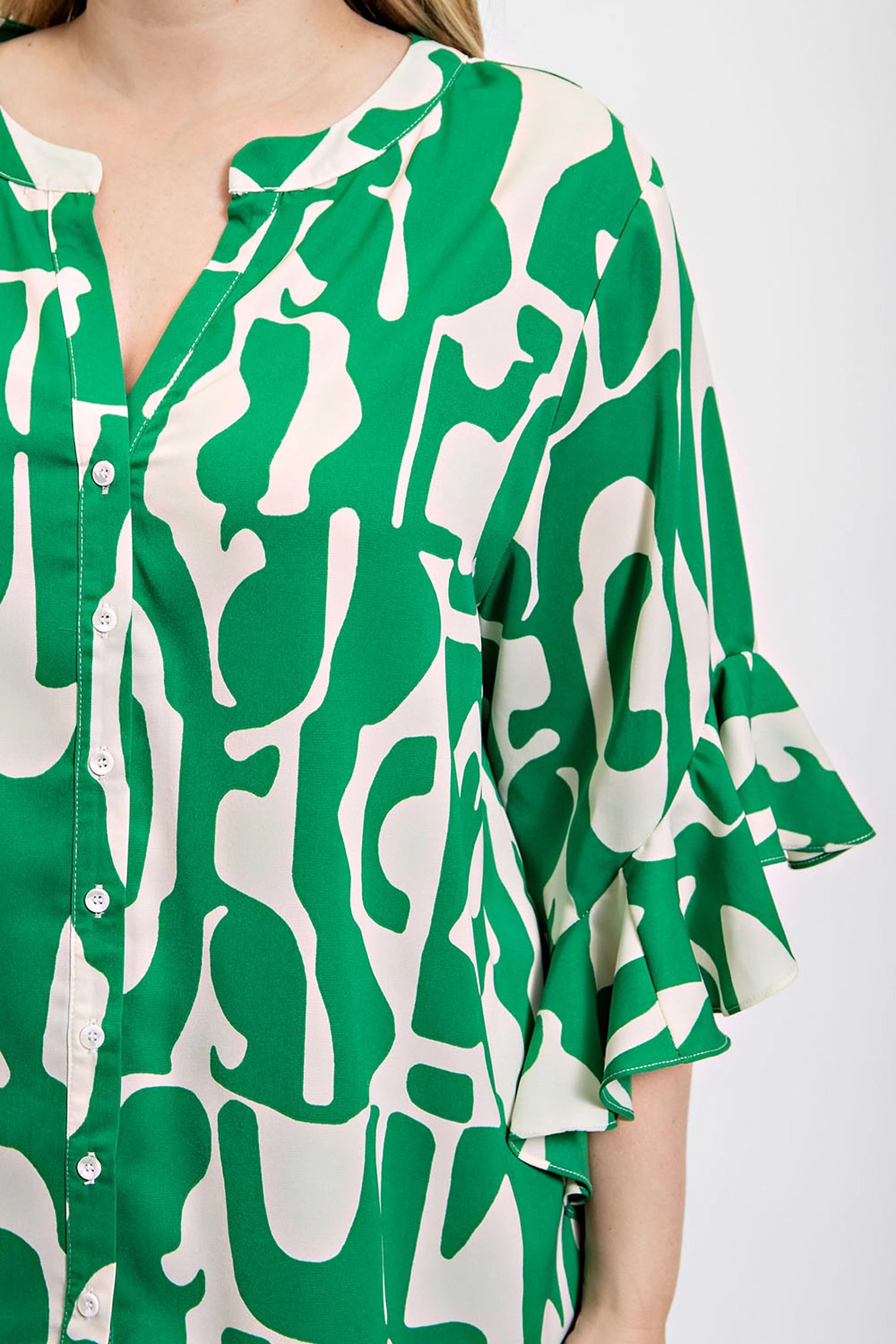 Geometric print ruffled bell sleeve woven top